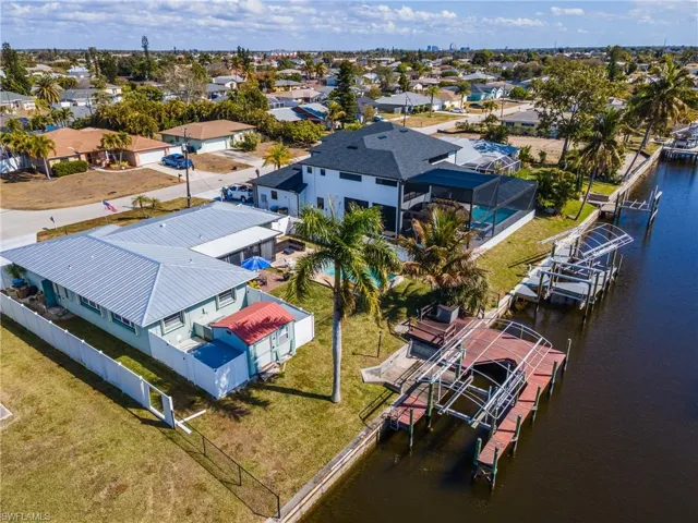 Aerial view of residential area with a nearby body of water