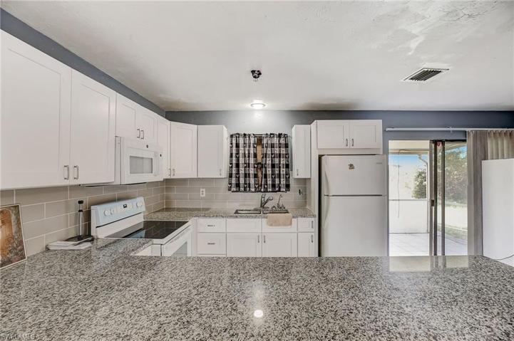 4212  4th W ST, Lehigh Acres, FL 33971