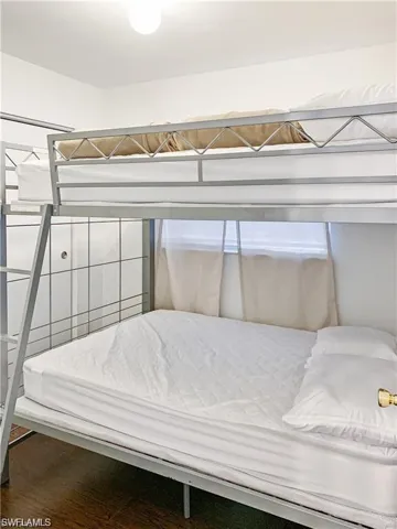 Bedroom featuring hardwood / wood-style floors