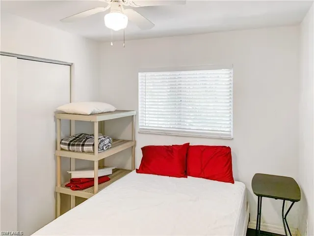 Bedroom with a closet and ceiling fan