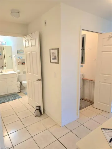 Bathroom featuring vanity and light tile patterned floors
