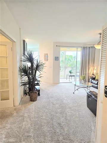Living room with carpet floors