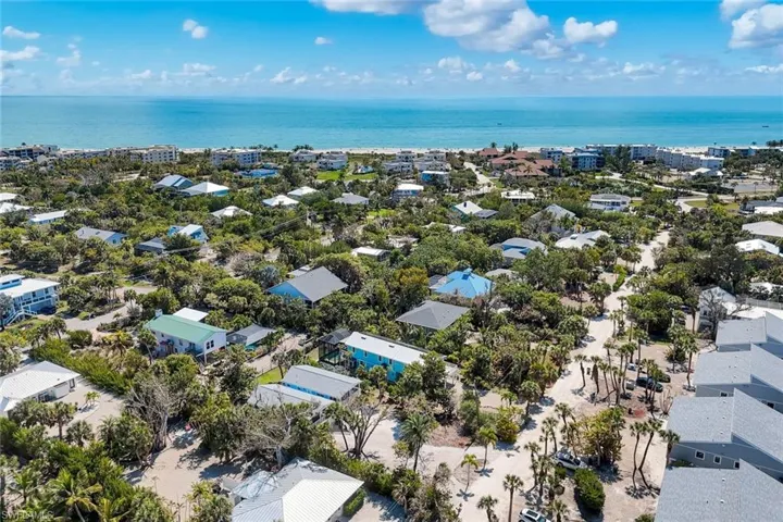 Aerial view of residential area with a nearby body of water