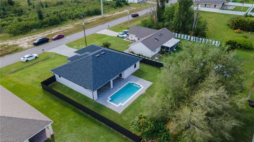 View from above of property featuring a pool