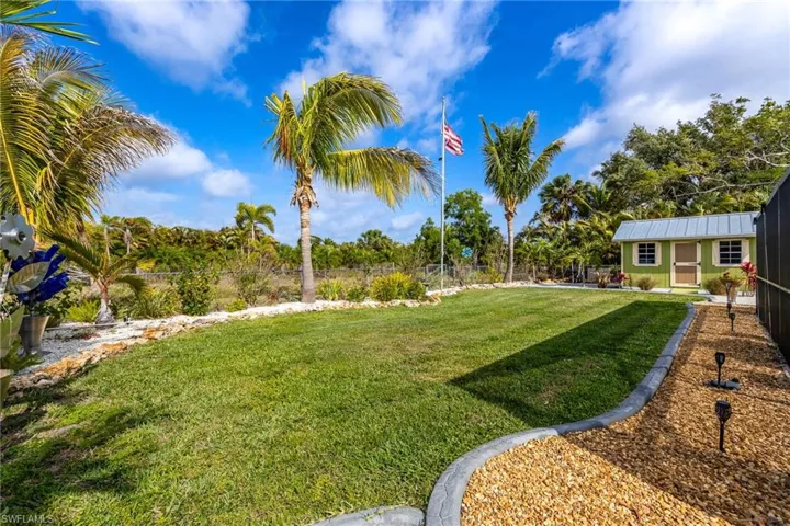 The fenced backyard backs up to agricultural land so you will enjoy the privacy