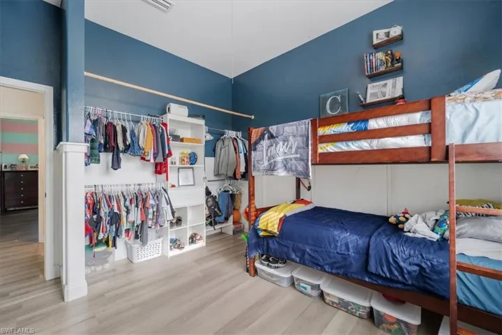 Bedroom with wood finished floors