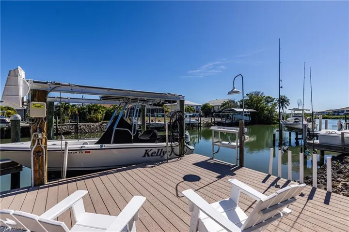 Dock with a water view and boat lift