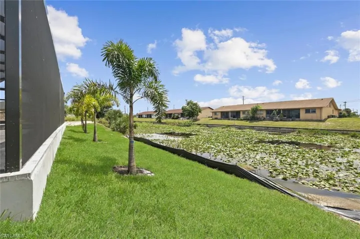 Surrounding community featuring a lawn