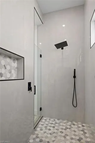 Bathroom with tiled shower