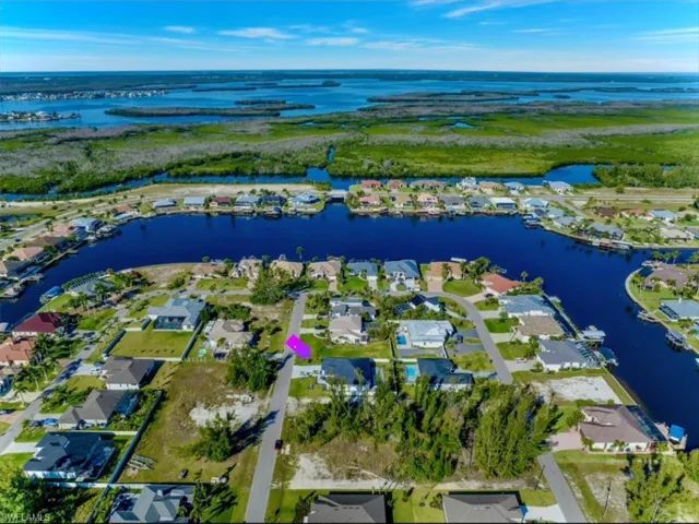 Bird's eye view with a water view and a residential view