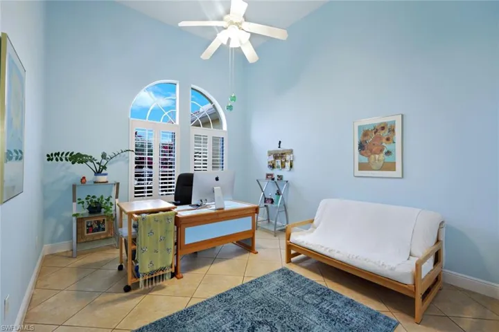 Office/den, with it's high ceilings, could also be a  4th Bedroom. (It has a closet)