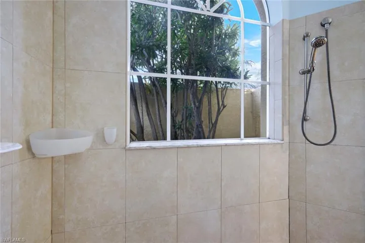 Primary bath tiled shower.