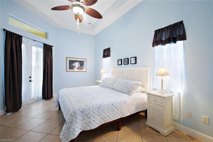 Primary bedroom with french doors to lanai.