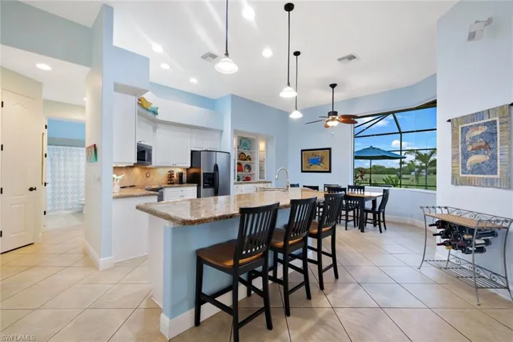 Kitchen featuring granite countertops and stainless steel appliances.