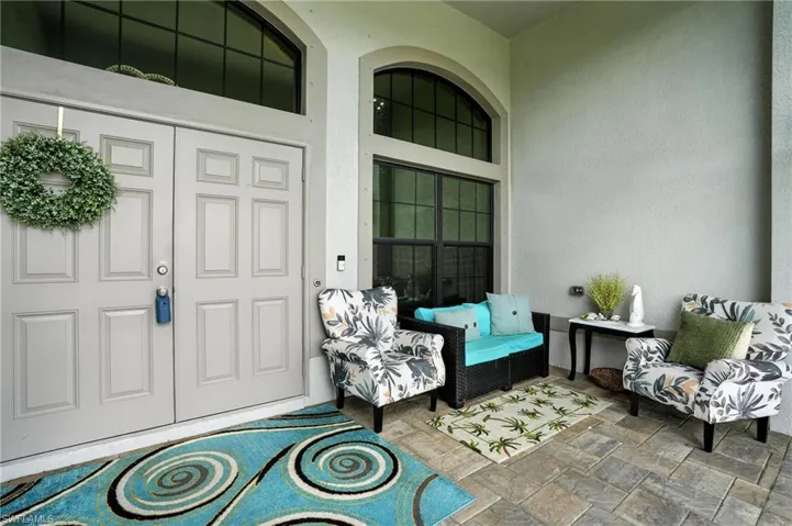 Outdoor pool featuring a patio and a lanai
