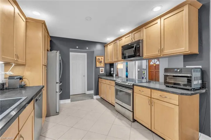 Galley Kitchen with opening to living room