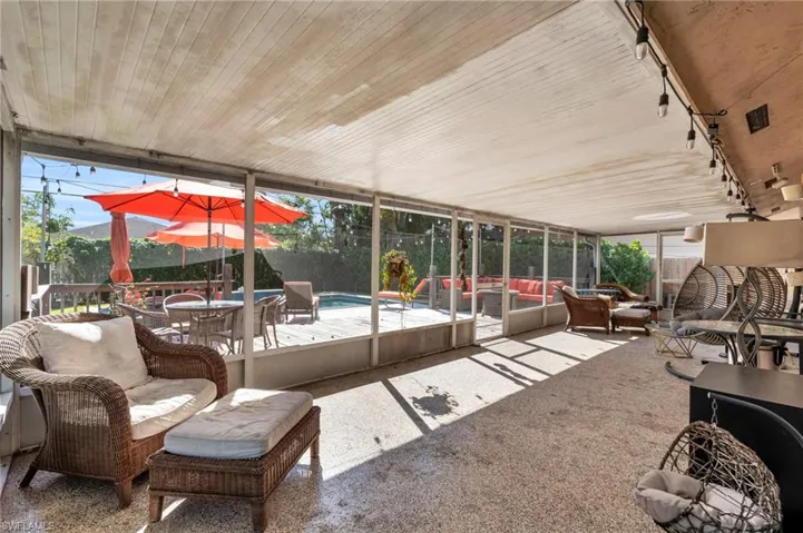 Indoor/Outdoor Living Space overlooking the built in pool