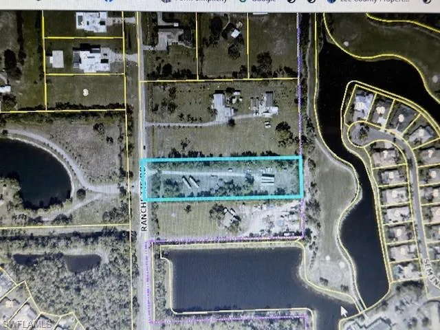 Aerial map of property and surrounding area with property boundaries highlighted