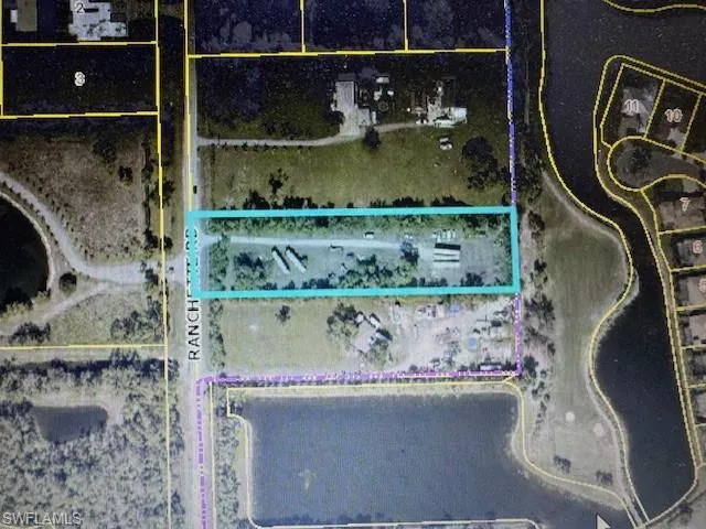 Aerial map of property and surrounding area featuring property boundaries highlighted