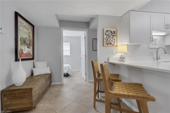Doorway leads to the den while 2nd bathroom and 2nd guest bedroom are to the right