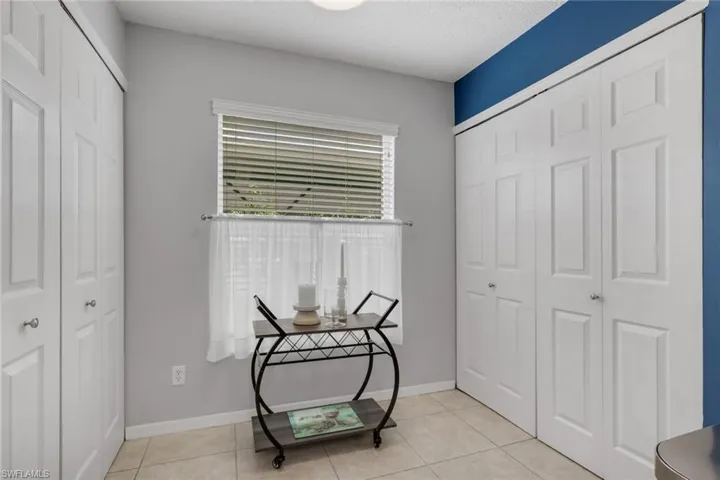 Doors to the left are to the pantry while the doors to the right house the washer and dryer