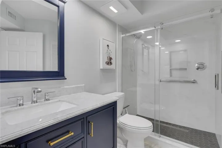 Recently remodeled with new countertops, shower stall and fixtures