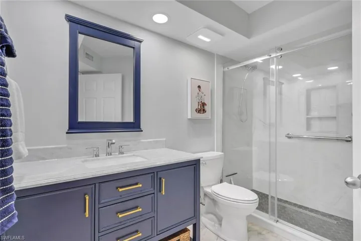 Recently remodeled with new countertops, shower stall and fixtures