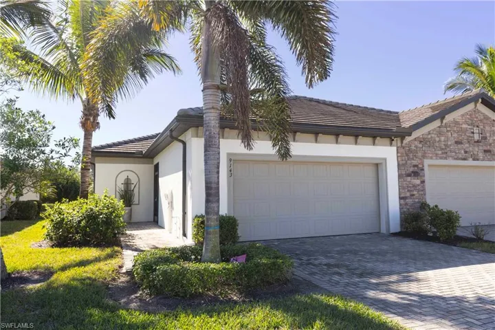 View of front of home with a garage