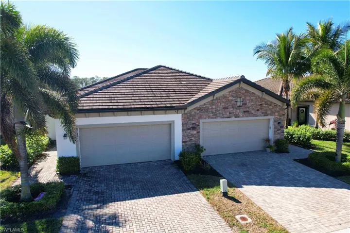 View of front of home featuring a garage