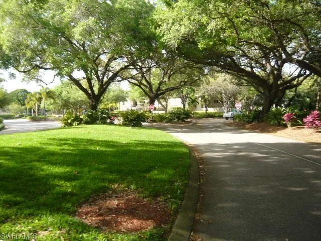 Surrounding community featuring a lawn