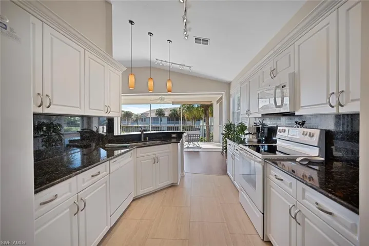Kitchen with white appliances