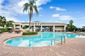 View of swimming pool with a patio
