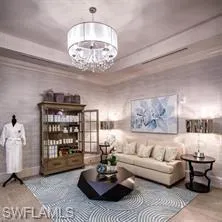Living room featuring an inviting chandelier