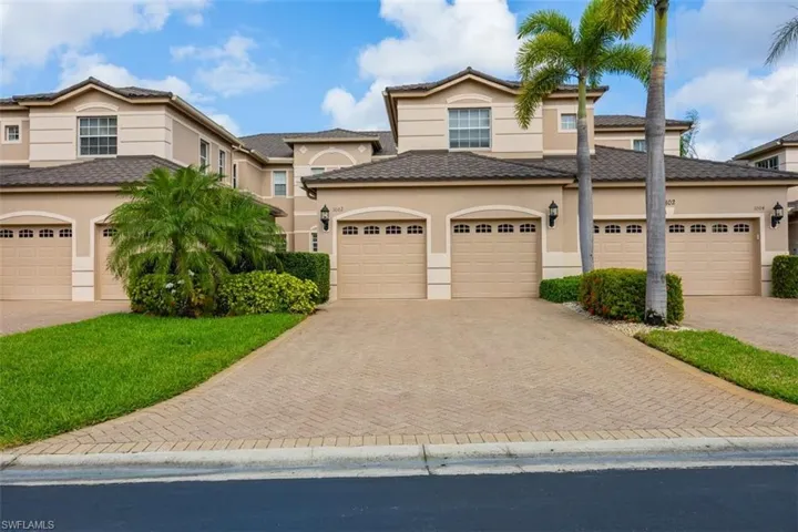 View of front facade featuring a garage