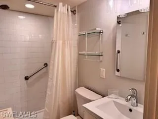 Full bath with vanity, shower / bath combination with curtain, and recessed lighting