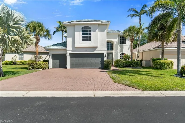 Freshly painted exterior modernizes this 2-story, river community home