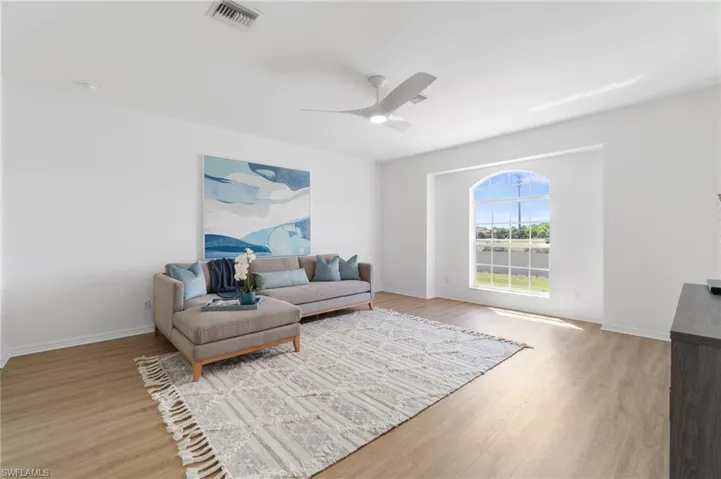 Spacious, well lit bonus room offers space for entertainment, and/or possible workout room
