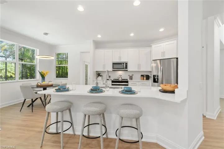 A breakfast bar provides extra dining space for those quick bites....