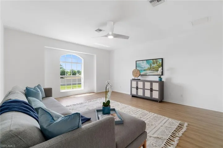 Spacious, well lit bonus room offers space for entertainment, and/or possible workout room