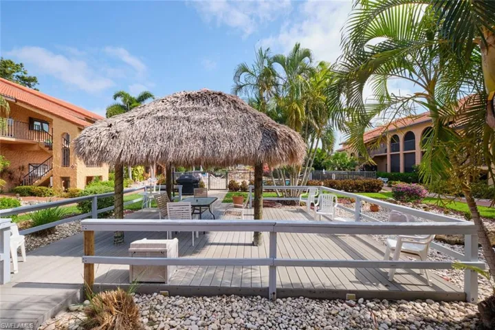 View of property's community featuring a wooden deck
