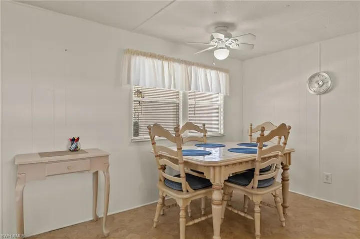 Dining space with ceiling fan