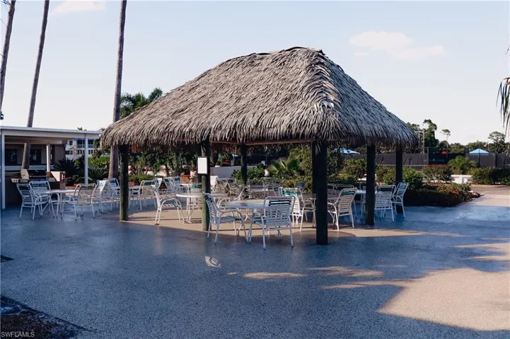 View of property's community with a patio area and a gazebo