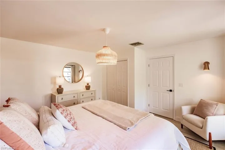 Bedroom with a closet and baseboards