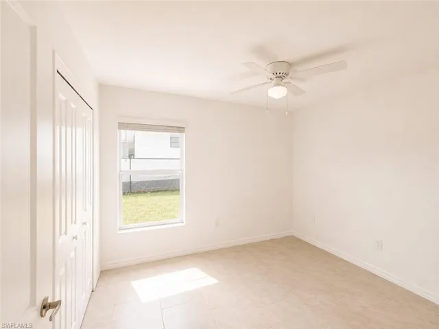 Neutral wall tones with tile flooring