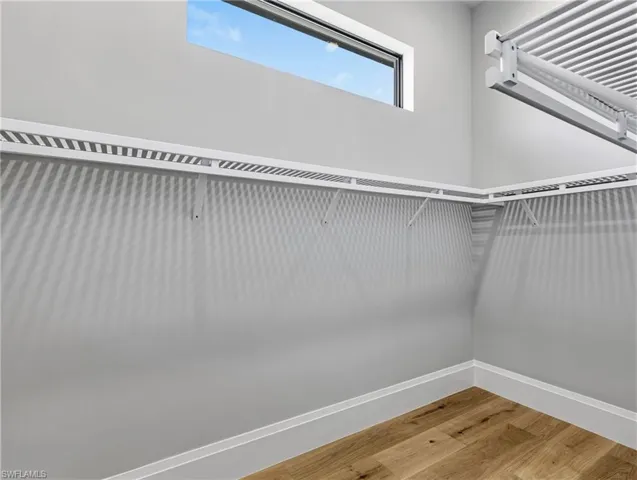 The primary suite has two walk-in closets.