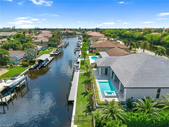 Direct gulf access new construction luxury home on saltwater canal in Palmetto Point adjacent to Gulf Harbour Yacht & Country Club!
