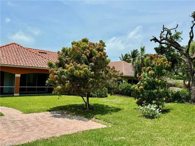 Surrounding community featuring a sunroom