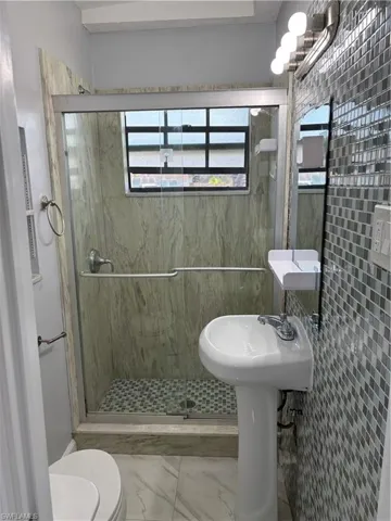 units #1 and #2 newly renovated bathroom.