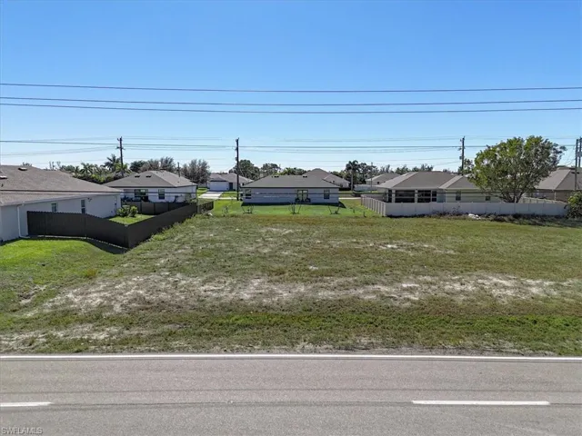 View of front of property with a residential view