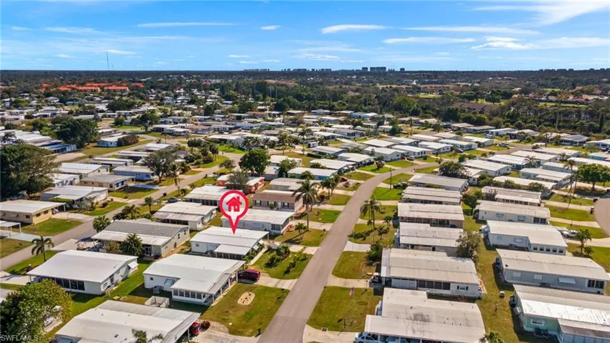 Birds eye view of property with a residential view